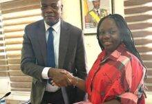 • Mrs Asante and Mr Abdulai in a hand shake after the meeting