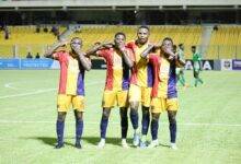 Players of Hearts of Oak join Linda Mtange (first right) to celebrate the second goal