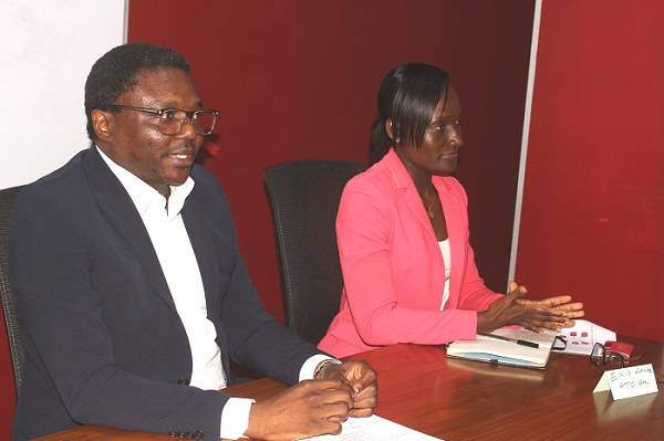 • Mr Yahaya Nasamu Yunusa (left) addressing the media personnel. With him is Ms Enid Kanor