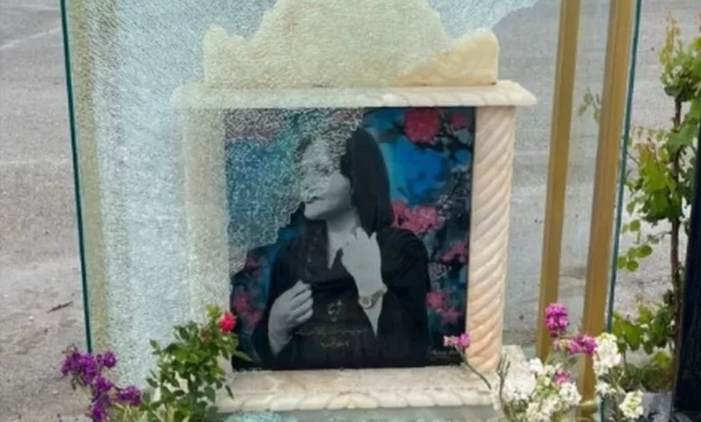 Glass covering Mahsa's tombstone and portrait was smashed