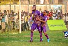 Vincent Atinga (left) joined by a teammate to celebrate his match winner
