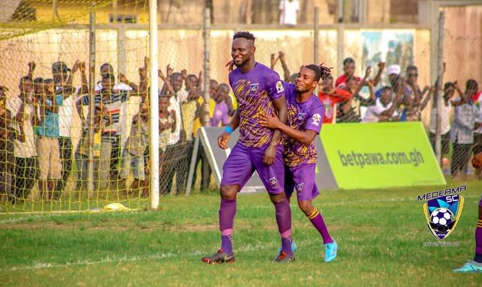 Vincent Atinga (left) joined by a teammate to celebrate his match winner