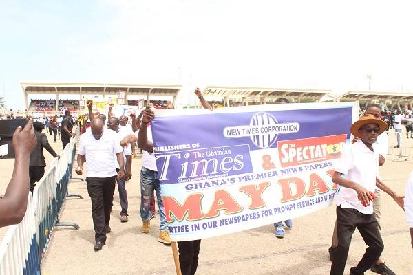 Workers of New Times Corporation marching at Blackstar Square