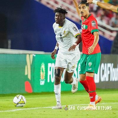 Black Meteors Emmanuel Yeboah confronted by a Moroccan marker