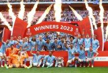 • Man City players celebrating after defeating United to win the FA Cup
