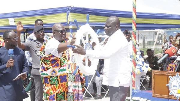 Captain Afadzi (left) handing over symbol of office to new Director, Takoradi Port, Mr Amoo-Bediako