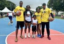 Ms Mackey(second right),Mohammed(right) and Jerad(left) in a pose with some of the young talents at the Camp