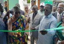 • Inset: Mr Ignatius Baffour Awuah (second right), Baffour Panyin Frimpong-Akomfohene of New Juaben Traditional Area (middle) and Mr Seth Kwame Acheampong cutting the tape to inaugurate the facility