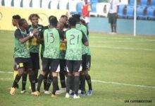 Players of Dreams FC celebrating the second goal