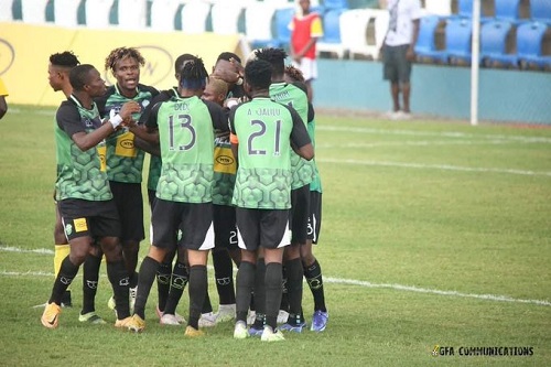 Players of Dreams FC celebrating the second goal
