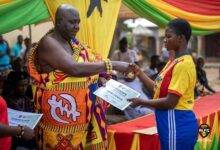 • Nana Kofi Krah II (right) presenting a certificate to one of the participants