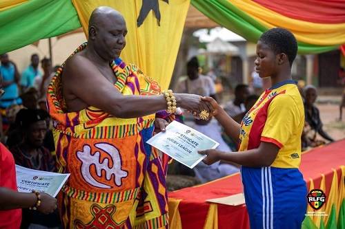 • Nana Kofi Krah II (right) presenting a certificate to one of the participants