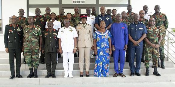 Cpt Erzuah (fifth from right) with Vice Adimral Amoama ( fourth from left) and some personnel of the Ghana Armed Forces after the ceremony