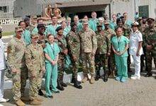 Major General Wasmund (middle) with MEDREX team and medical doctors at 37 military Hospital