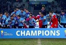 • Uruguay celebrating with their trophy