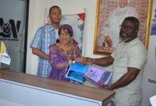• Dr Erika Bennett exchanging the document with Mr Kwadwo Baah Agyemang (right) Photo: Godwin Ofosu-Acheampong