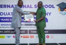 • Mr Addai (right) receiving the award on behalf of late Breanna