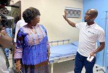 Mrs Mensah being conducted round the wards by Dr Isaac Kofi Adu, a Clinical Embryologist