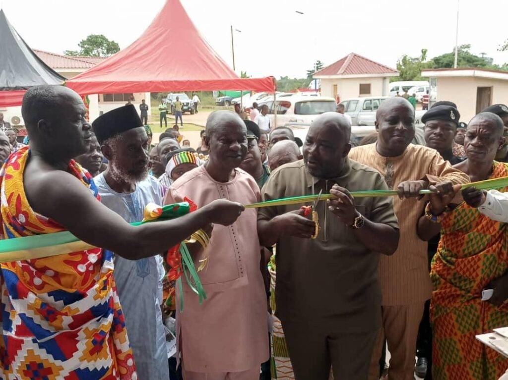 Inset, Mr Baafi (third from right) being assisted by other dignitaries to cut the tape to inaugurate the factory