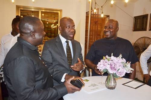 Mr Kojo Oppong Nkrumah(middle) in a chat with Mr Yaw Sarpong Boateng(right) and Mr Albert Dwomfour. Photo Godwin Ofosu-Acheampong
