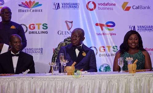 The Asantehene (middle) seated with Vodafone CEO (right) at the dinner
