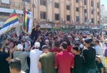 • A photo from activist collective, Suwayda24, showed protesters waving Druze flags in Suweida's al-Sayr square on Tuesday