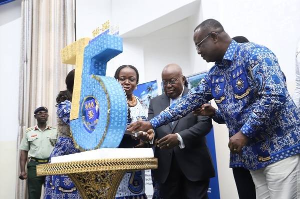 • President Akufo-Addo (second from right) being assisted by Mr Joseph Osei Owusu (right), First Deputy Speaker of Parliament, and Prof. Nana Aba Appiah Amfo (third from right) to cut the anniversary cake
