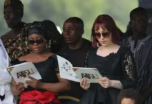• Atsu's wife Rupio and sister at the funeral