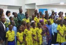 The dignitiaries with some children at the event. Photo Godwin Ofosu-Acheampong