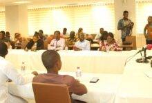 Mr Hassan Tampuli (standing) addressing journalists in the dialogue. Photo. Ebo Gorman