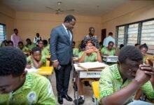 Rev Ntim Fordjour inspecting a section of the BECE candidates