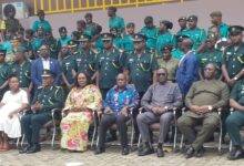 Naana Eyiah Quansah (seated fourth from left) with dignitaries and GIS personnel after the programme
