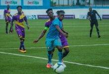 Medeams Captain Baba Musa challenged by a Remo Stars players
