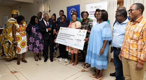 Mr K.T. Hammond (third from left) unveiling the fund together with other dignitaries and beneficiaries