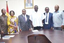 Mr Bryan Acheampong(fourth from right) wit the committee members . Photo Godwin Ofosu-Acheampong