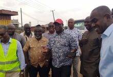 Mr Amoako Atta(in cap) with other officers during the isnspection