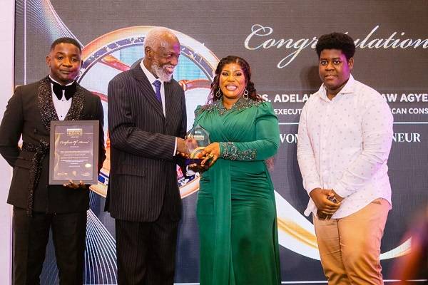 Mrs. Siaw-Agyepong (second from right) receiving her award from Prof Stephen Adei