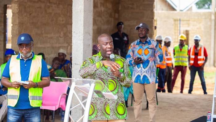 Mr Kojo Oppong Nkrumah speaking at the programme. With him is Dr Nsiah-Asare