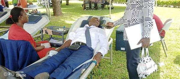 Mr Andoh donating blood during the exercise