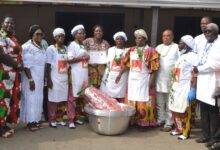 Ms Sowah (middle) with the Agbawe We group and other dignitaries Photo Victor A. Buxton