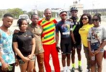 • Young Phil (fourth right) with his mother (second right), other relatives and officials of the Ghana Cycling Federation