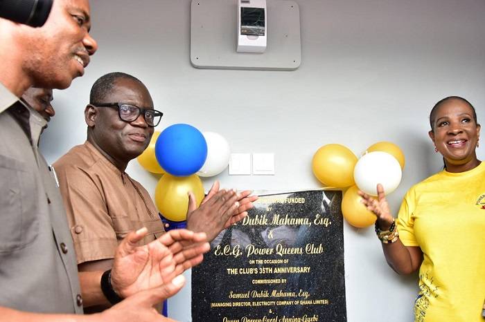 • Mr Obeng, in brown and Mrs Anning-Gyebi applaud after unveiling the plaque to commission the facility (inset).