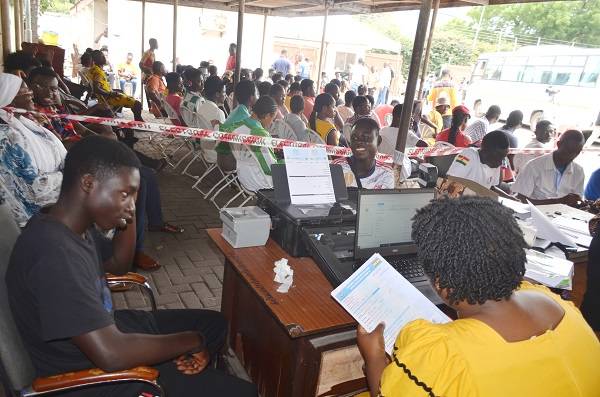 • Eligible voters undergoing registration with others in Ayawaso Central Photo: Godwin Ofosu-Acheampong