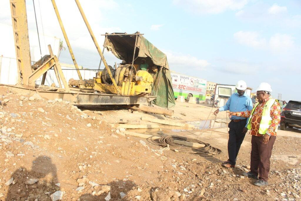 Mr Arthur (right) explaining the ongoing works to our reporter.  Photo Anita Nyarko-Yirenkyi  .