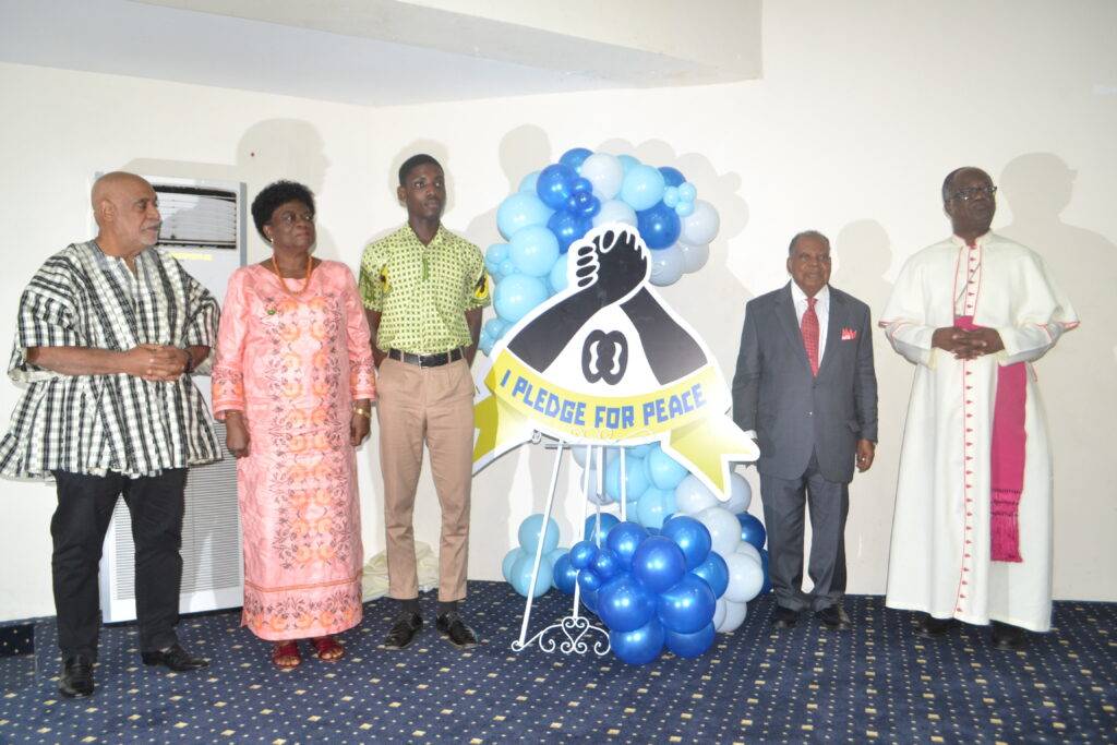 • Mrs Anno-Kumi (second from left) with Nana Dr. Asante
(second from right), Mr Abani (left) and other dignitaries
after unvailing the peace logo Photo Victor A. Buxton
