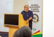 Dr Charles Abani (inset) addressing participants in the programme