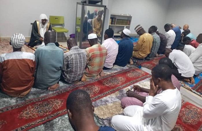 Sheikh Tuntunba leading the Muslims in prayers in the Mosque