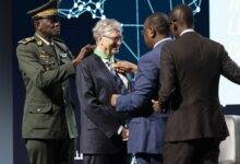 • Mr Bill Gates being decorated with National Order Award by President Macky Sall