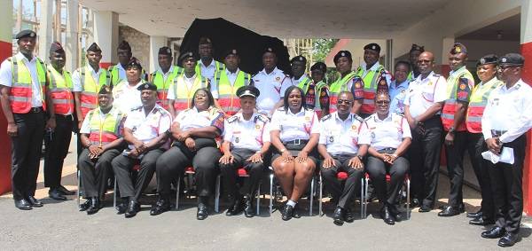 • Mr Julius Kuunuor (seated middle) with members of the taskforce
