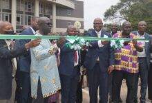 • Hamidu Akulugu (fourth from left), Mr Paul Simon Koranteng (fourth from right) and other dignitaries cutting a tape to open the national pension fair Photo: Stephanie Birikorang